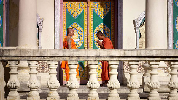 Cambodian monks are greeting each other