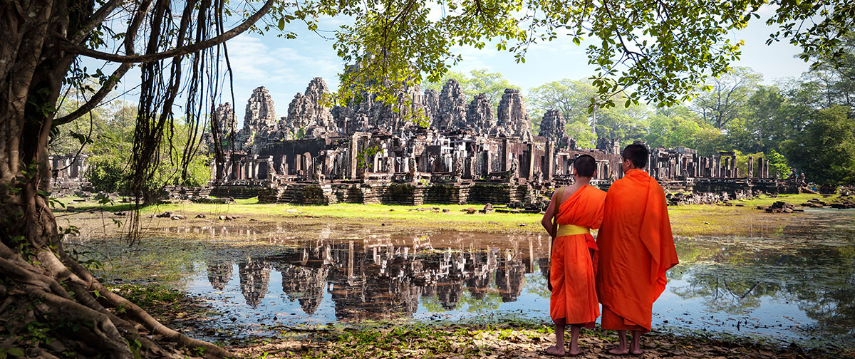 Cambodian Monks standing near a heritage