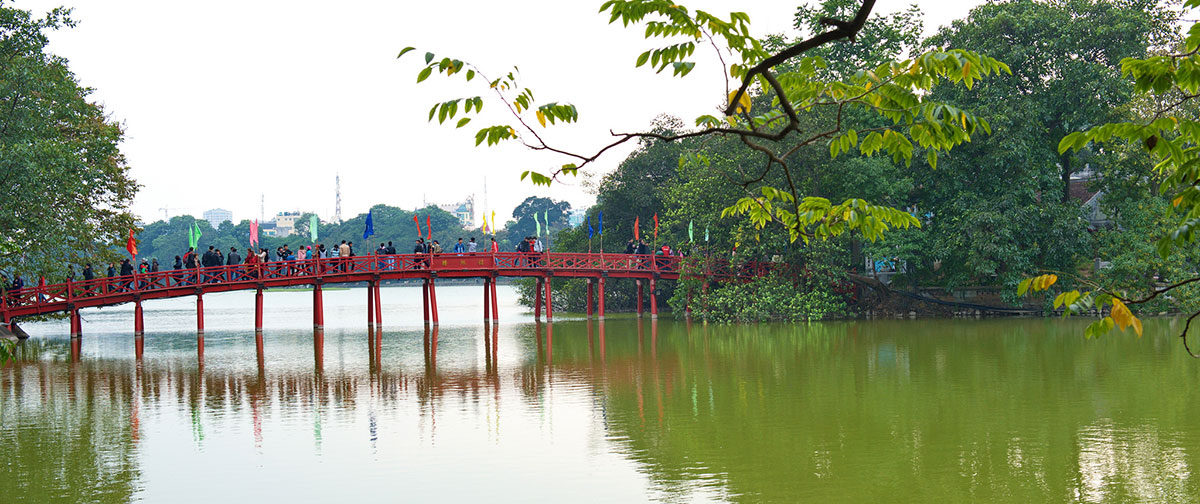 The Huc Bridge in the reflection of Hoan Kiem Lake